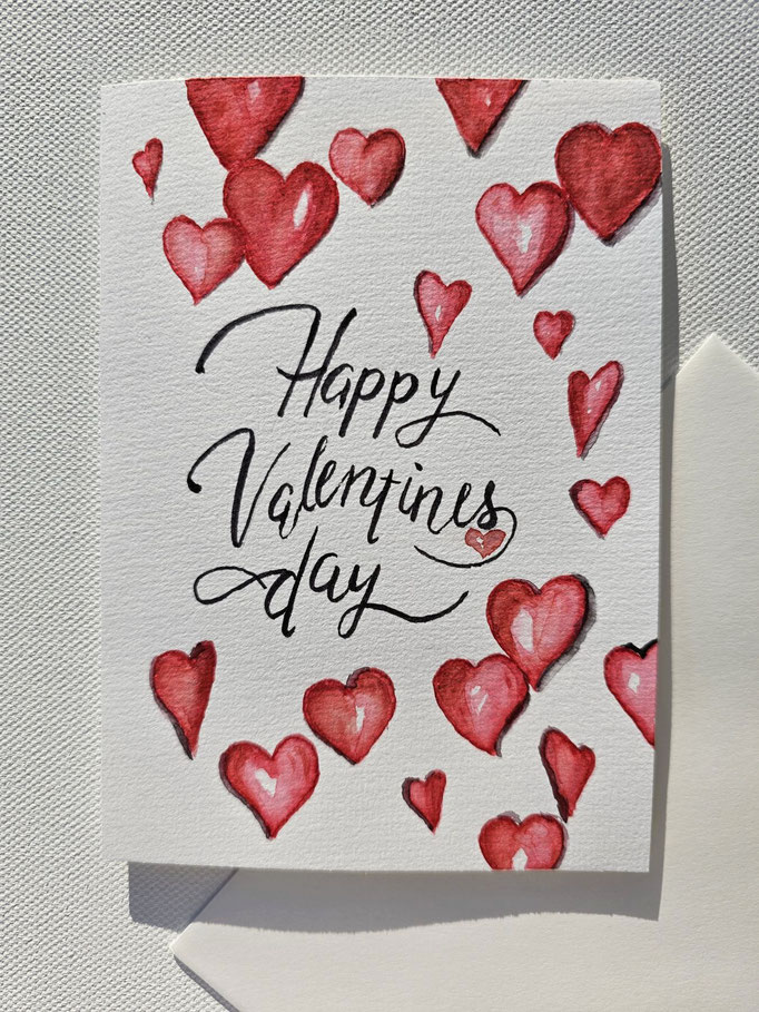Valentinskarte für liebe Valentinstagsgrüße: Aquarell Herzen mit "Happy Valentines Day" Handlettering