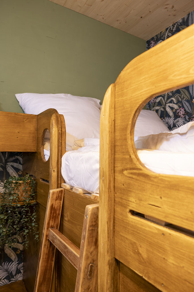 Oberes Bett im Haus “Botanical”