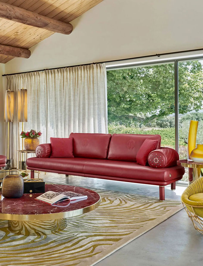 Nevada sofa designed by Luca Tornaghi for Roberto Cavalli Home, upholstered sofa with cylindrical bolsters and structured linear frame