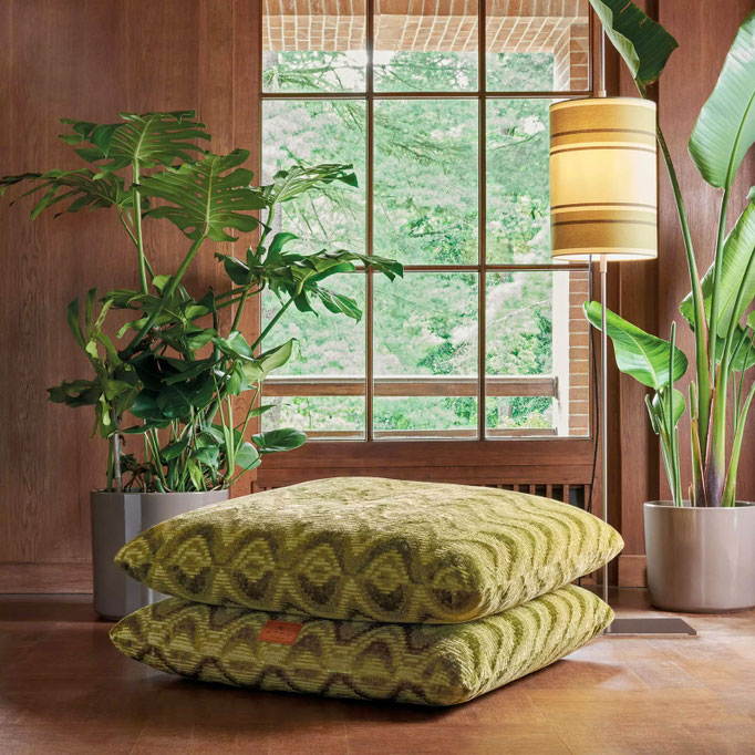 Cushy pouf designed by Luca Tornaghi for Etro Home, compact upholstered pouf with rounded volume and tailored textile surface