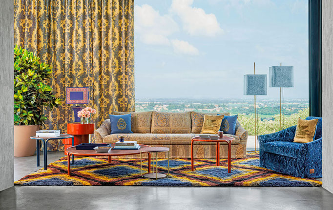 Neoclassical sofa designed by Luca Tornaghi for Etro Home, upholstered sofa with continuous seat cushions and integrated curved armrests