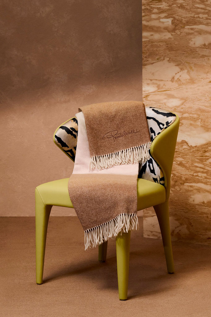 Caracal chair designed by Luca Tornaghi for Roberto Cavalli Home, upholstered dining chair with curved wraparound backrest and integrated animalier inner shell