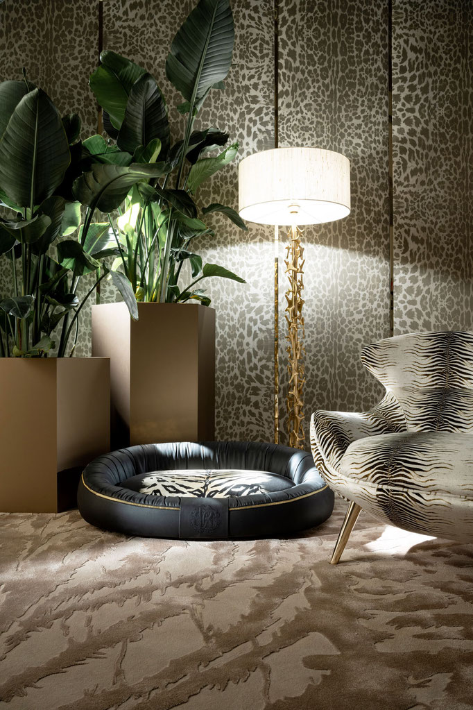 Wild dog bed by Luca Tornaghi for Roberto Cavalli Home, padded pet bed upholstered in leather featuring a visible gold-finish zipper detail and quilted RC logo on the front panel