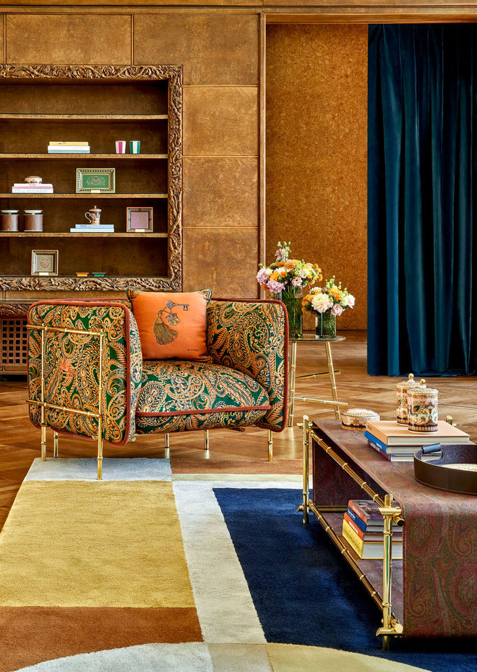 Reed armchair designed by Luca Tornaghi for Etro Home, lounge armchair with curved wooden frame and suspended upholstered seat