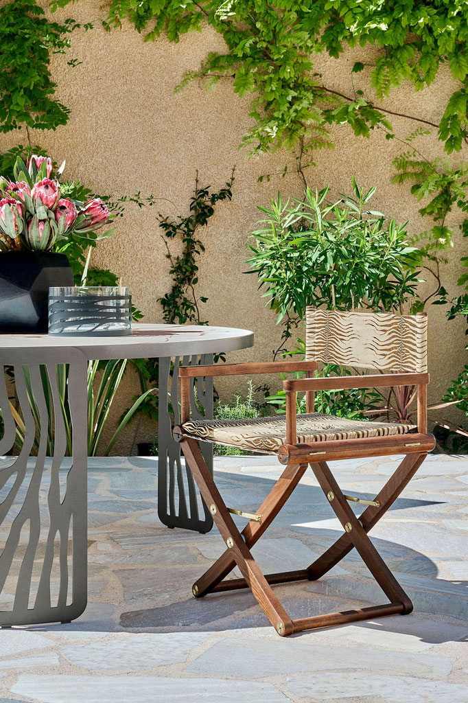 Capoverde outdoor chair designed by Luca Tornaghi for Roberto Cavalli Home, folding solid wood chair with animalier textile sling seat