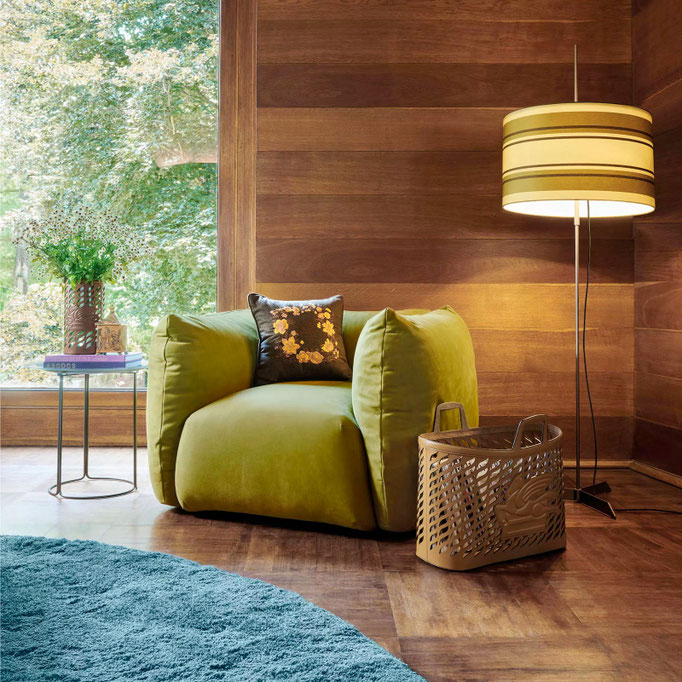Cushy armchair designed by Luca Tornaghi for Etro Home, compact leather armchair with soft sculptural volume and enveloping backrest