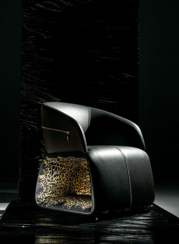 Wild armchair designed by Luca Tornaghi for Roberto Cavalli Home, sculptural leather armchair with wraparound shell and animalier interior surface