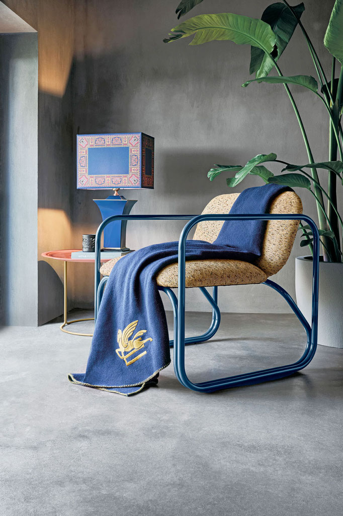 Piping armchair designed by Luca Tornaghi for Etro Home, lounge armchair with tubular metal frame and suspended upholstered seat