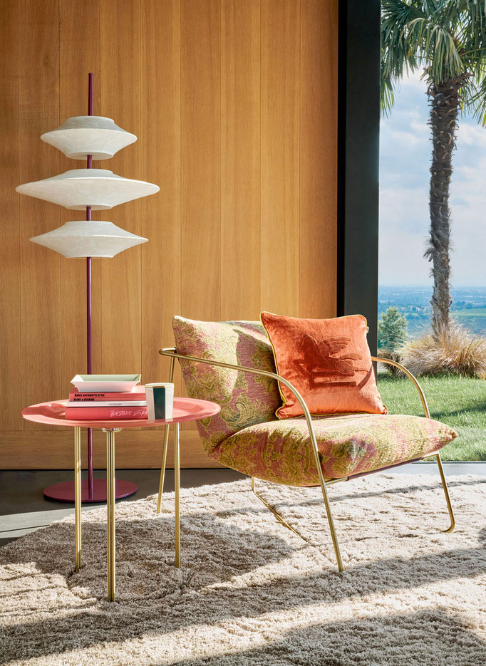 Levity armchair designed by Luca Tornaghi for Etro Home, light lounge armchair with slender metal frame and suspended upholstered seat