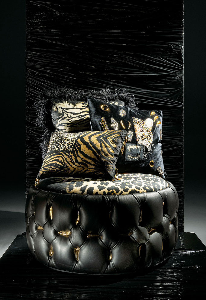 Wild pouf designed by Luca Tornaghi for Roberto Cavalli Home, tufted leather pouf with sculptural volume and metal feather detailing