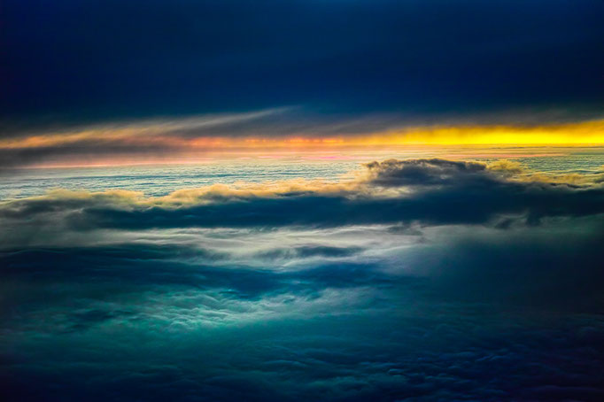 Sunset above the clouds, flight from Kopenhagen to Stuttgart