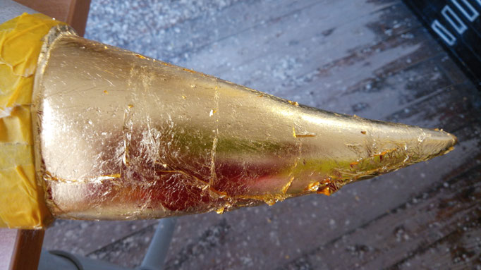 Skluptur vergolden auf Stein
