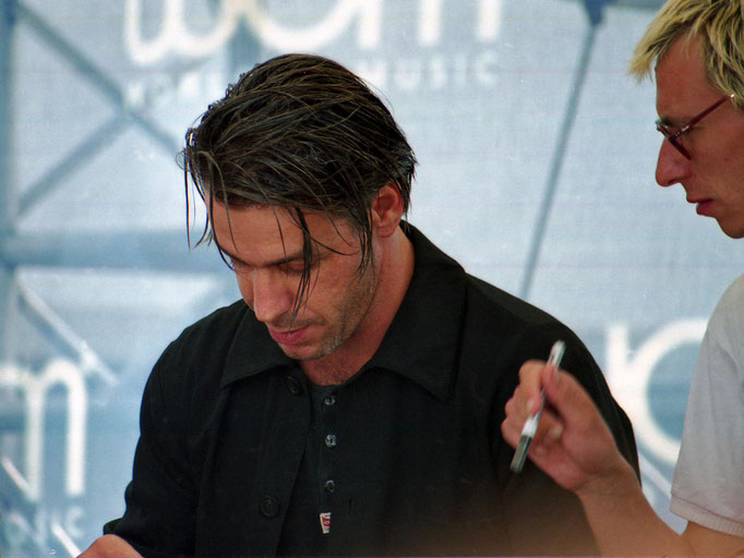 1997 Till Lindemann (Rammstein) during a signing session in Cologne in 1997.  Scan from analogue film.