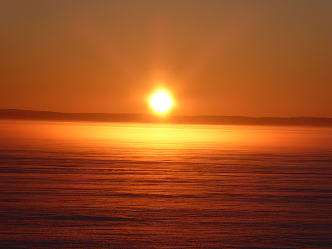 Amazing sunsets at frozen Lake Päijänne near the house ...