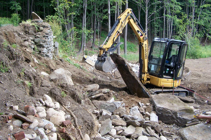 Pulling out a large stone