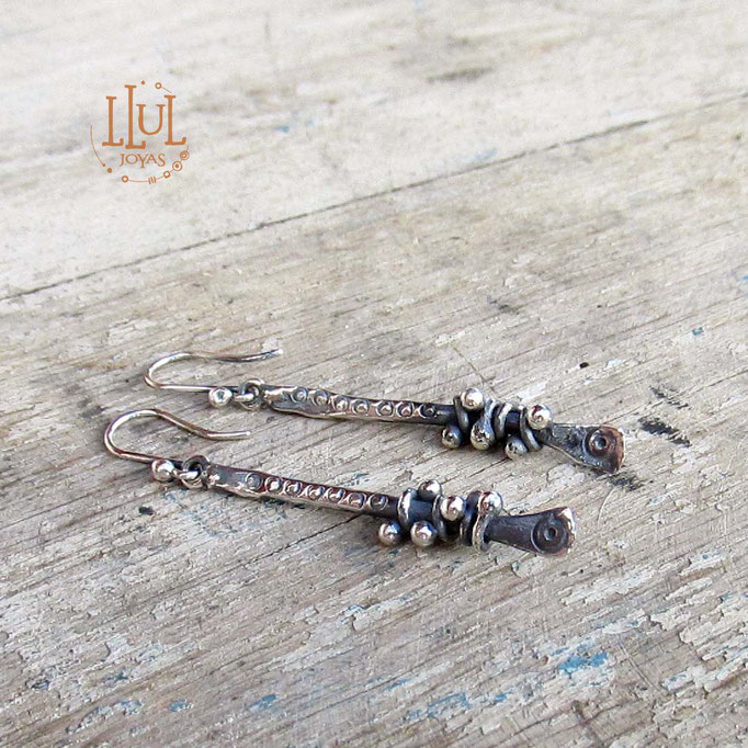 Aretes hechos a mano en plata 950.
