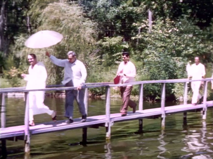 1956 ; Meher Center, Myrtle Beach, SC. ; Meher Baba walking across the Center's bridge. The images were captured by Anthony Zois from a film by Sufism Reoriented.