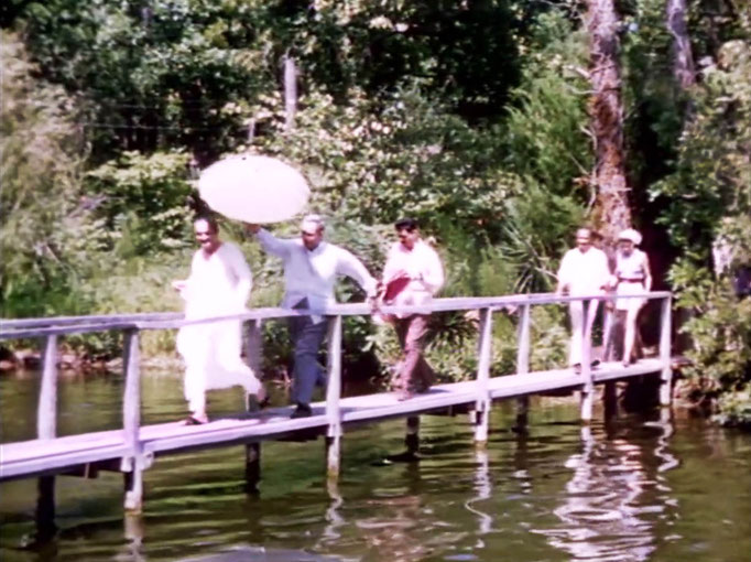 1956 ; Meher Center, Myrtle Beach, SC. ; Meher Baba walking across the Center's bridge. The images were captured by Anthony Zois from a film by Sufism Reoriented.