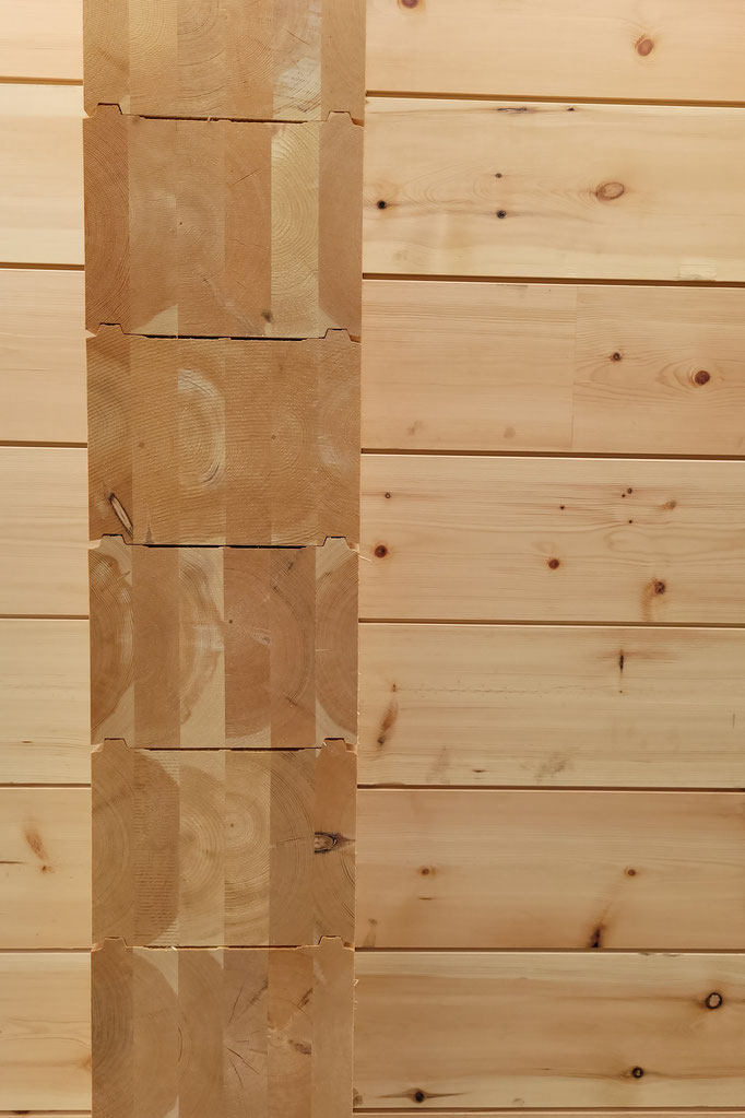 Traditionelle Eckverkämmung - Blockhausbau - Lamellenbalken
