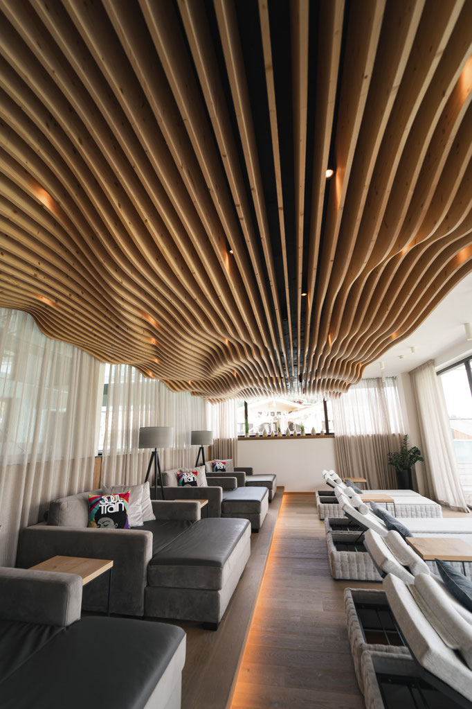 A stylish relaxation room in the wellness area of the Hochkönigin Wellness Hotel in Maria Alm, Salzburg