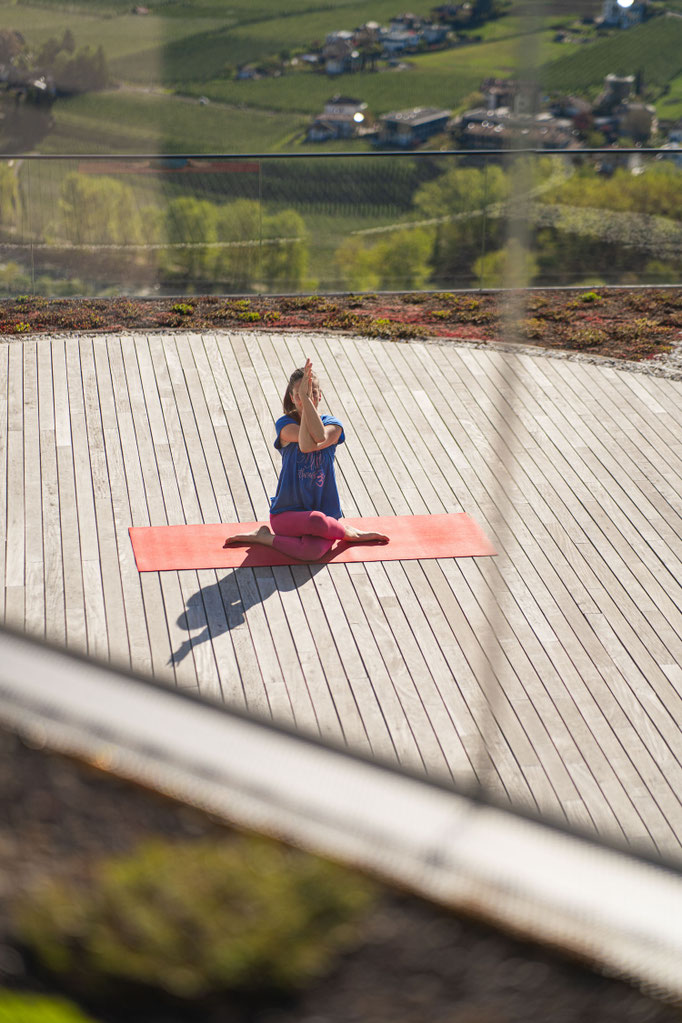 Morning yoga with mountain views on the rooftop terrace