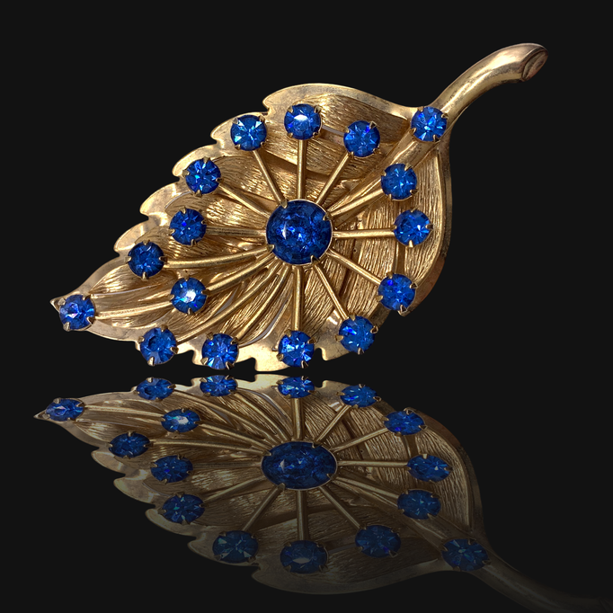 Gorgeous Gold Tone Brooch Vintage Leaf Motif Brushed and Smooth Textures with sparkling blue Capri chatons- Art.706/6