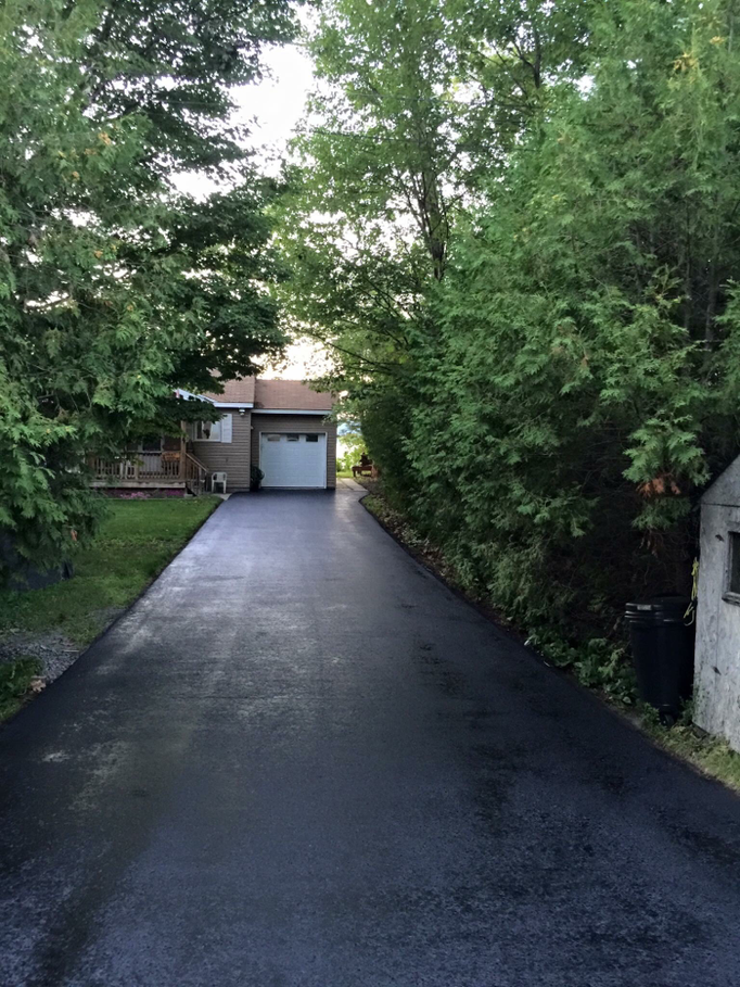 driveway sealing Stittsville clean asphalt surface