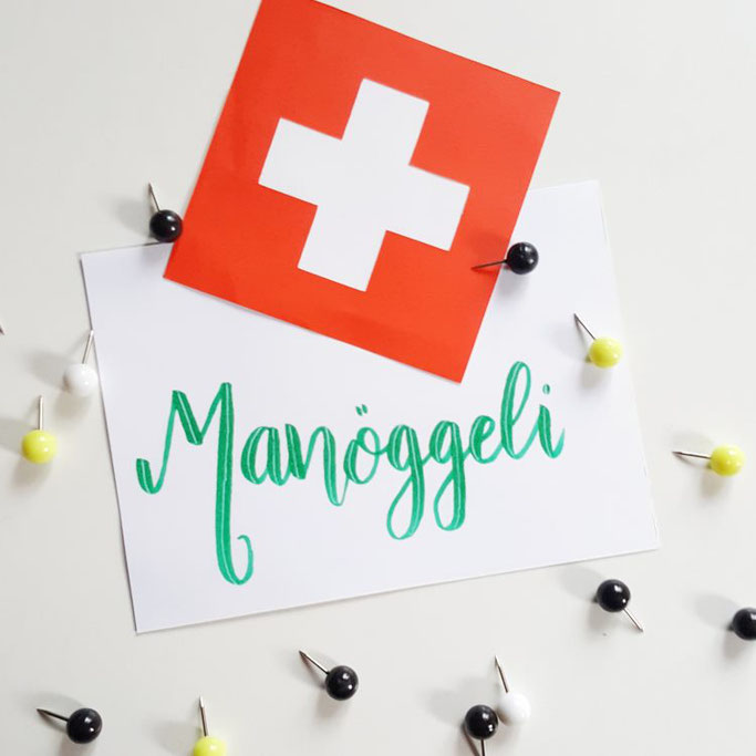 Schweizerdeutsches Handlettering: Manöggeli (Spielfigur)