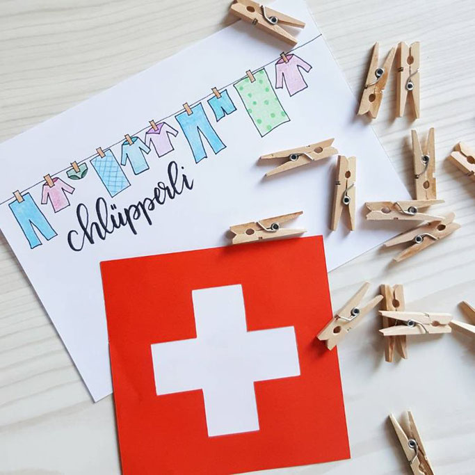 Lettering auf Schweizerdeutsch: Chlüpperli (Wäscheklammer)