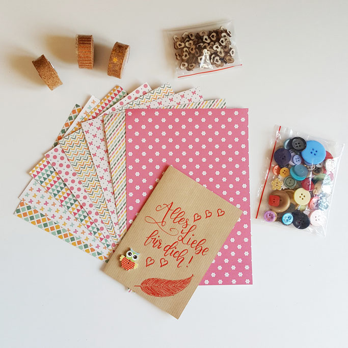 Letter Lovers Gewinnspiel: Preis 3 - ein Kreativpaket mit Washitape, speziellem Papier, Holzherzen und Knöpfen