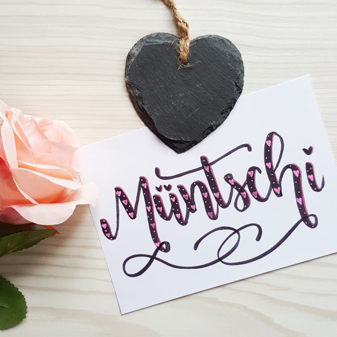 Schweizerdeutsches Lettering: Müntschi (Küsschen)