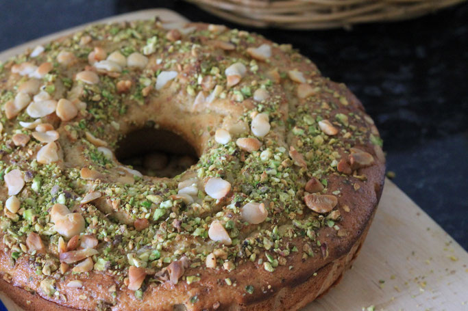 Pistachio and Almonds on top of this gluten free apple tea cake.