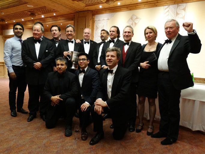 Old Cholmeleians XI posing at the gala dinner with the HM Ambassador David Moran in 2017