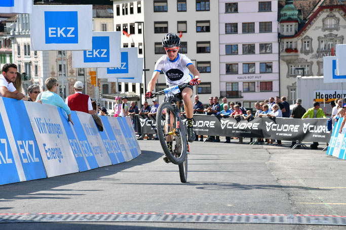 A wheelie (little bit failed due to tiredness), to celebrate the overall victory!