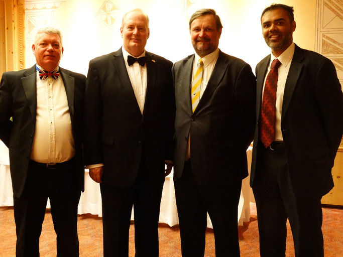 The umpires with the HM Ambassador, Mr. David Moran (second left)