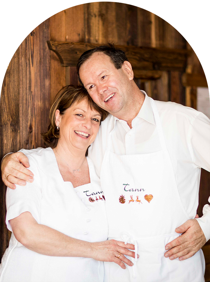 Hosts Barbara and Markus Untermarzoner welcome guests to their forest hideaway on the Ritten plateau.