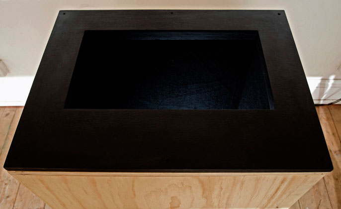 Well, 2009: single screen video box; wood, glass, acrylic, felt, LCD screen; 80hx50wx40d cm