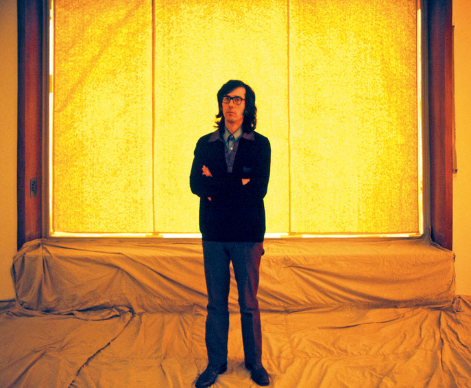 Wolgang Volz's first photograph of artist Christo, taken during Christo's and Jeanne-Claude's installation Wrapped Floors and Stairways and Covered Windows at Museum Haus Lange, Krefeld, Germany, in 1971.