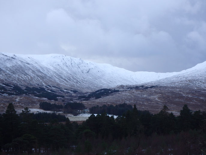 Grey sky over snowy mountains, Rannoch Moor, West Highland Way in Winter