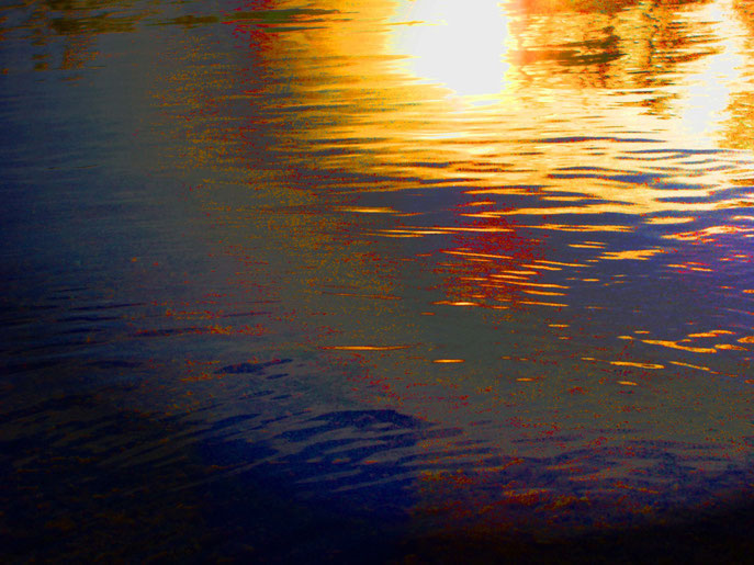Coucher de soleil sur l'eau