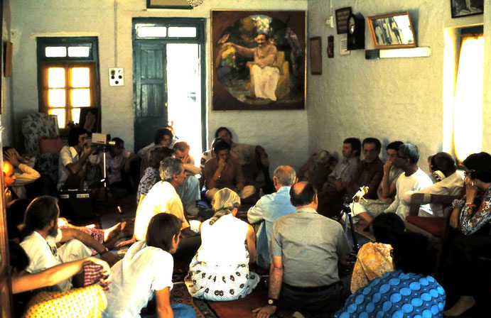 January 1975 - Mandali Hall, Meherazad - John ( wearing headphones ) is next to Eruch recording him. Photo by Anthony Zois