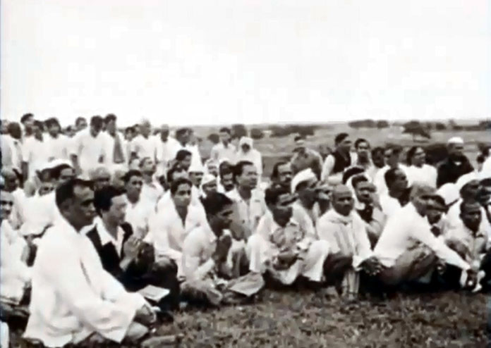 1954 , Meherabad, India ; Hitaka sitting with his hands together  - Courtesy of "Meher Baba's Call"