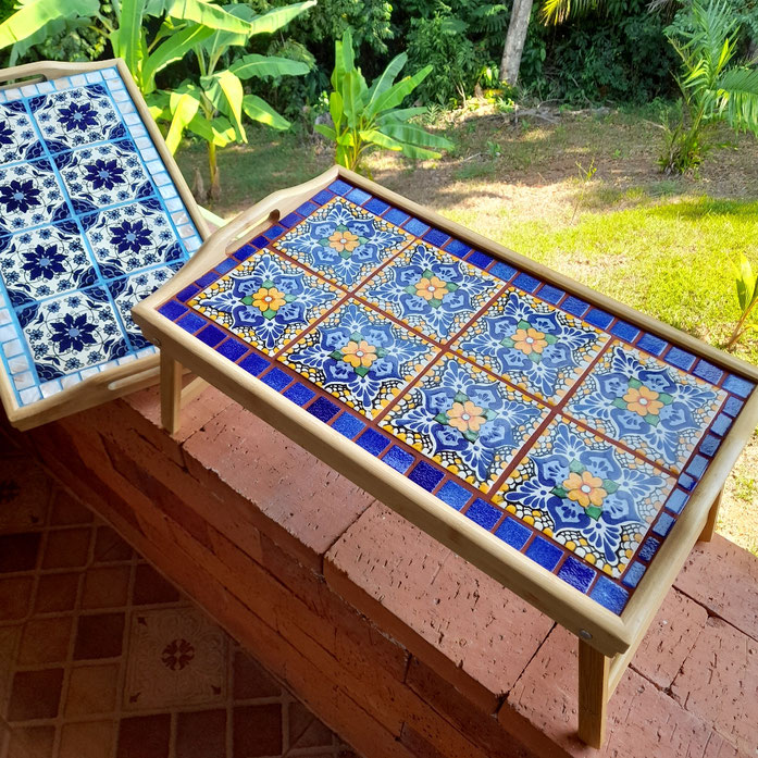 This serving tray has legs that fold down to convert into a bed table.  12"x20"