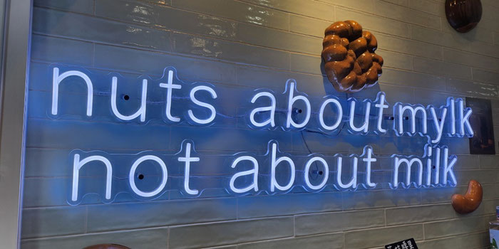 Nuts about mylk neon sign