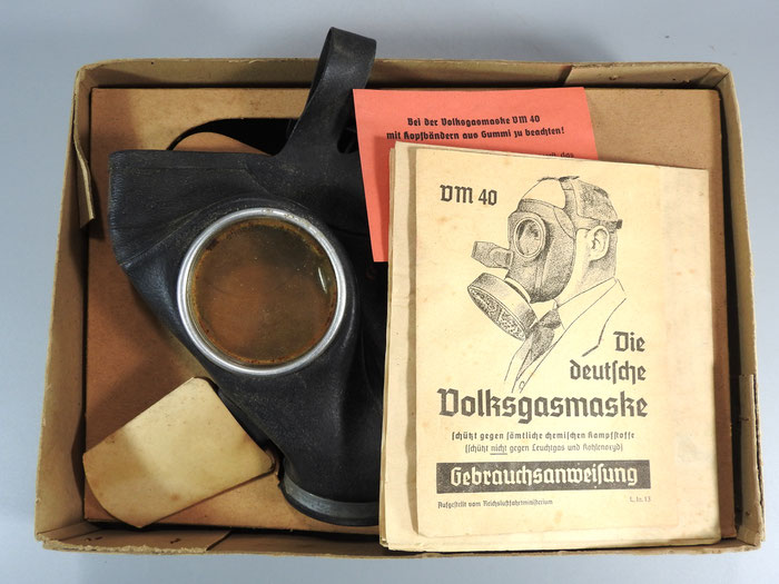 WW2 - GERMAN GAS MASK. ALL ORIGINAL, NEW OLD STOCK IN BOX. This is reference for how Frowo made lanterns from Gas Masks after the war