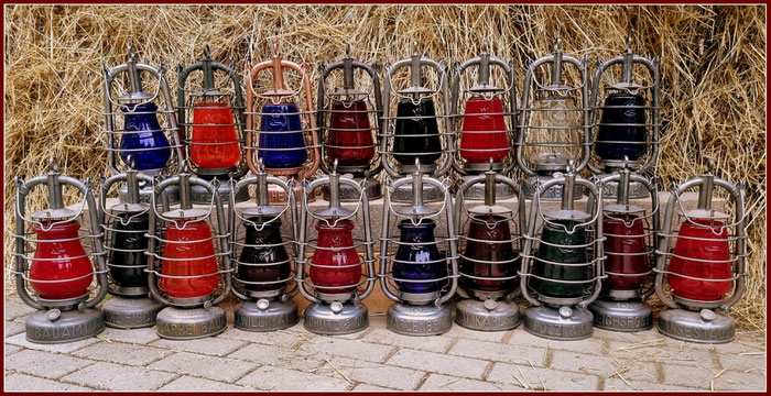 FEUERHAND KEROSENE LANTERNS MODEL NR. 201 WITH COLORED FEUERHAND GLOBES.