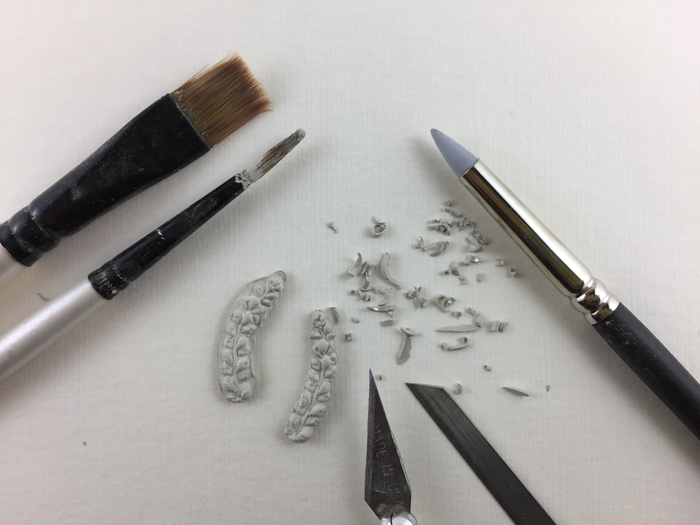 Silver metal clay pieces ready for kiln firing