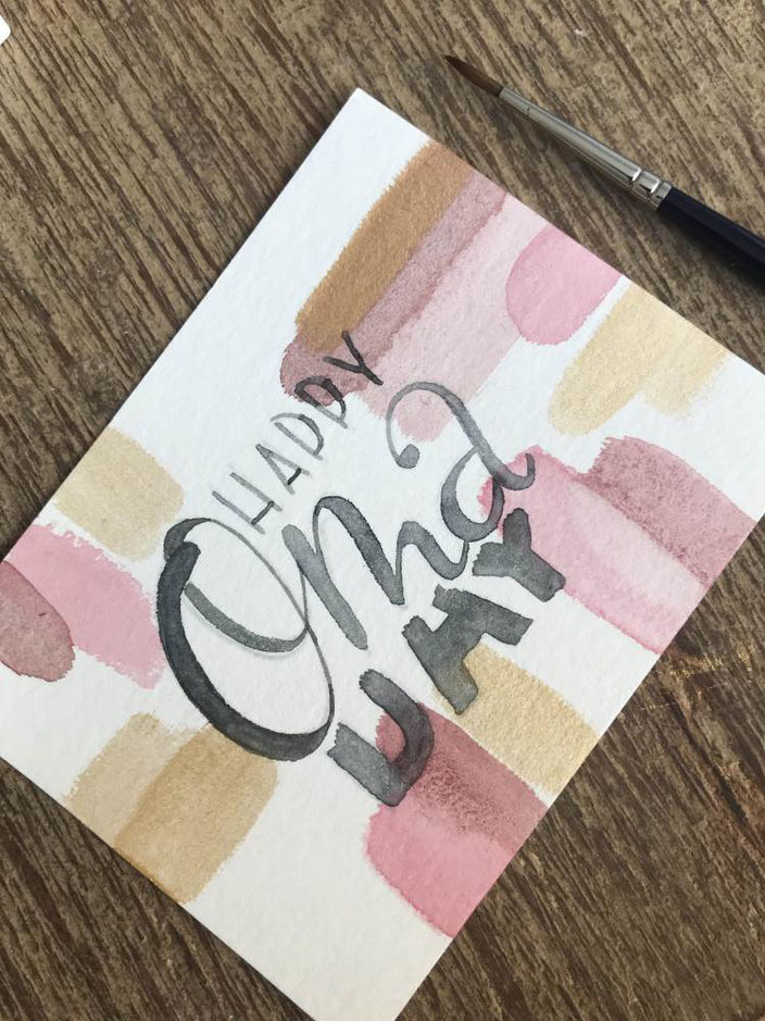 DIY Anleitung für eine Water Color Happy Birthday Karte mit dem Schriftzug Happy Oma Day (schwarz auf farbig).
