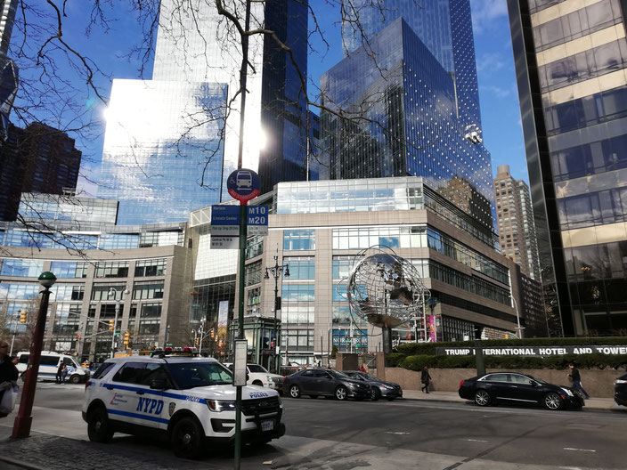 NYPD car in front of the Trump International Hotel and Tower in New York City