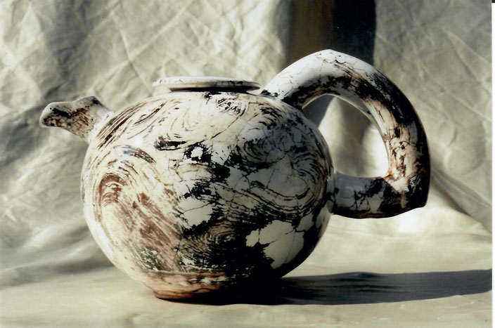 2003 tee pot turned, white glaze with black craquelé